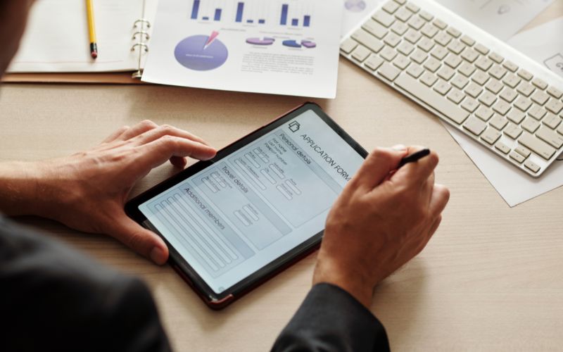 Someone filling out a form online